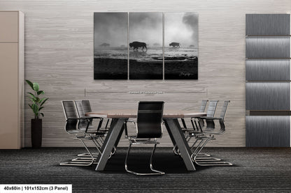 a black and white photo of a table and chairs