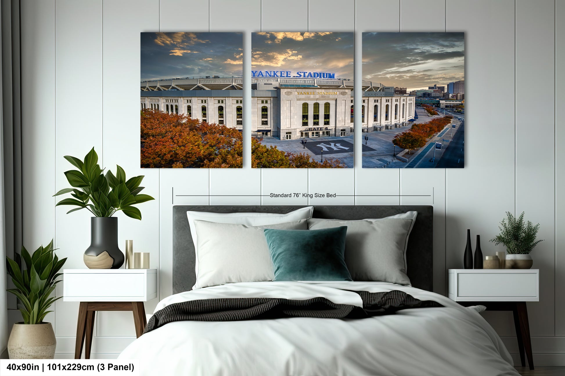 a bedroom with a bed and two pictures on the wall