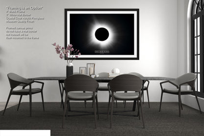a black and white photo of a dining room