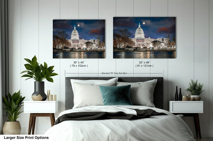 a bed with a white comforter and two pictures of the capitol building