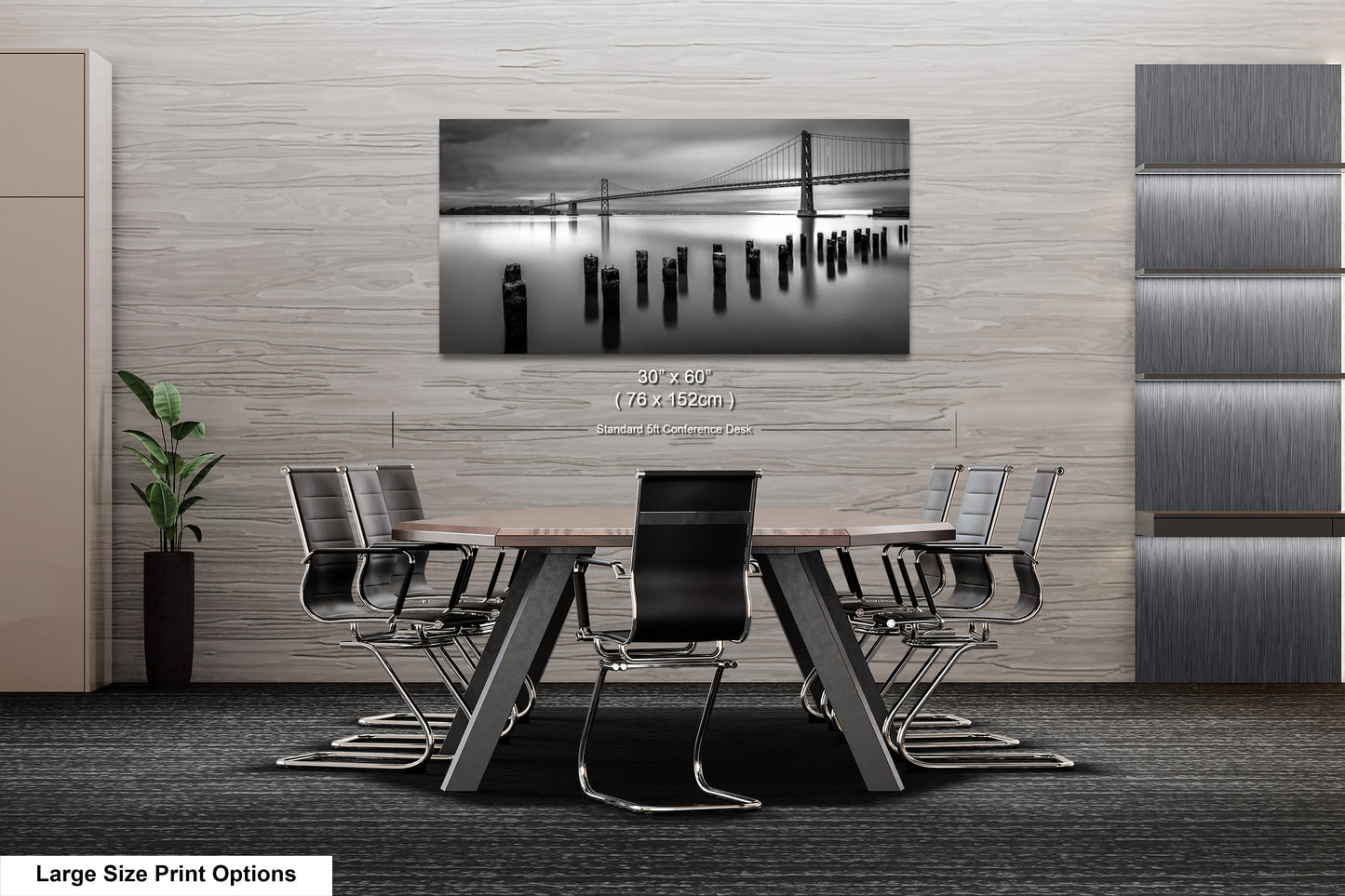 a black and white photo of a table and chairs