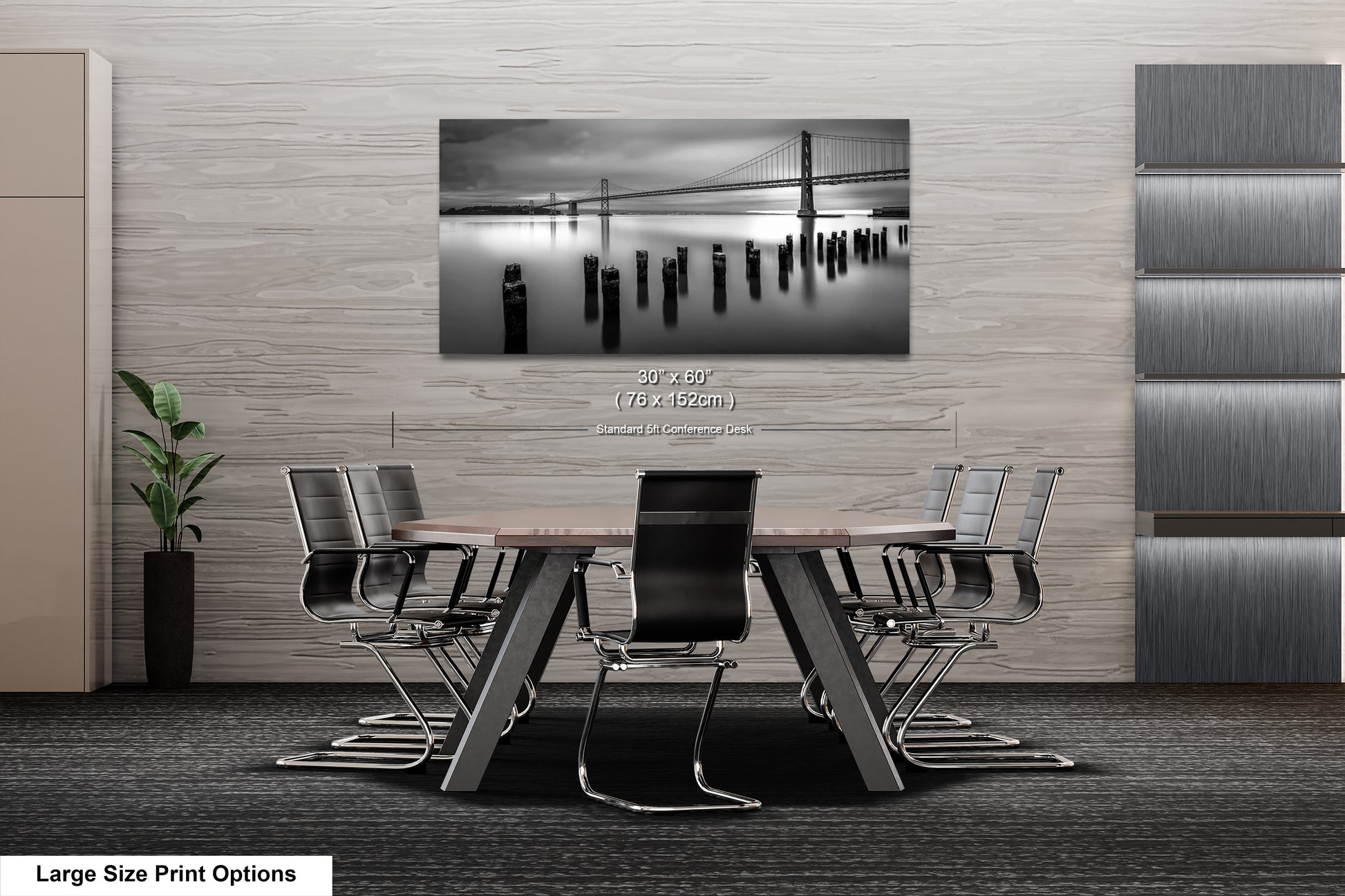 a black and white photo of a table and chairs