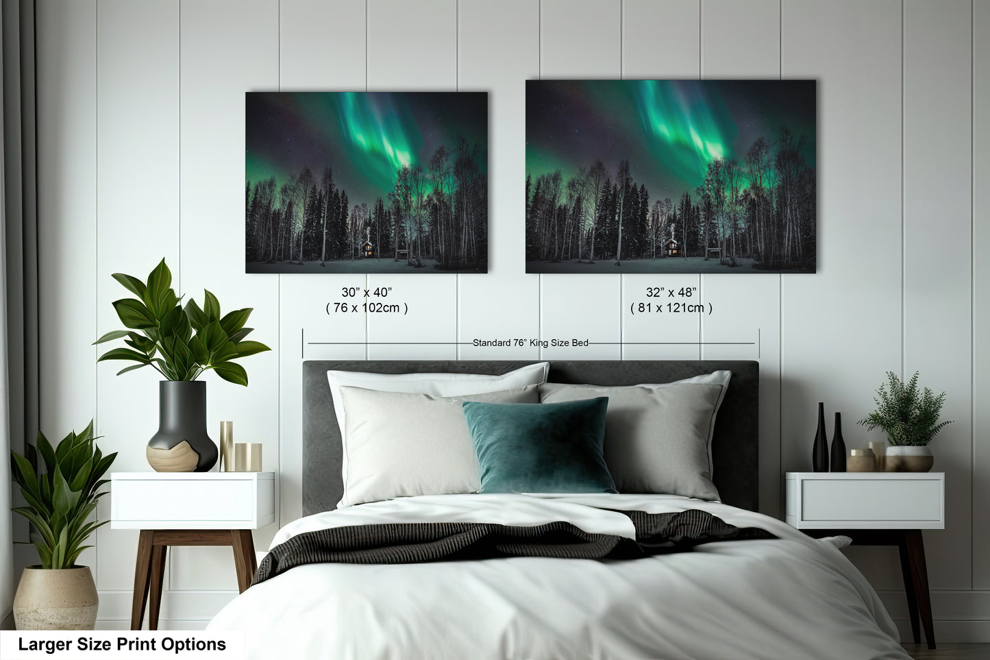 a bedroom with a bed and two pictures on the wall