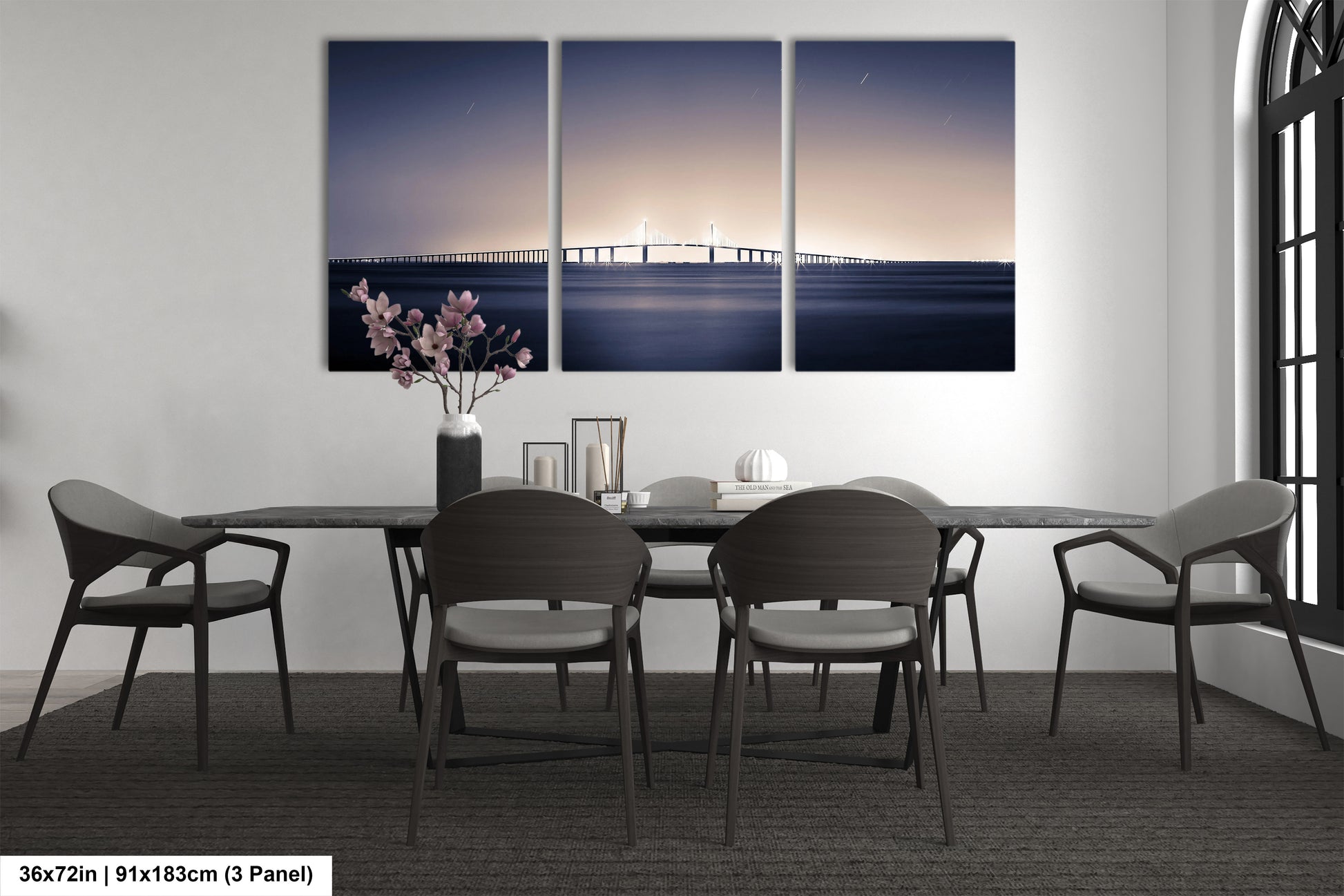 a dining room with a table and four chairs