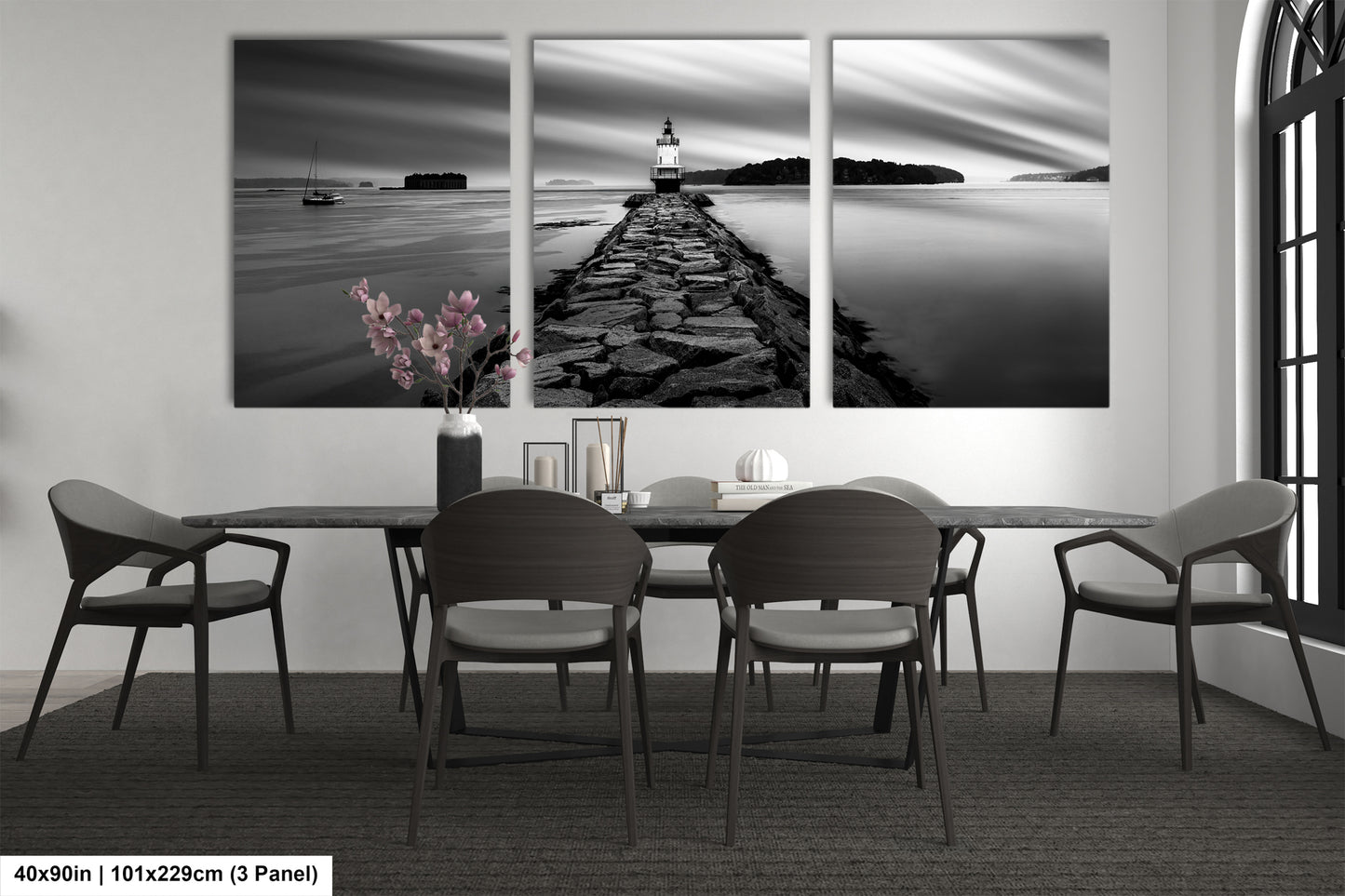 a black and white photo of a table and chairs