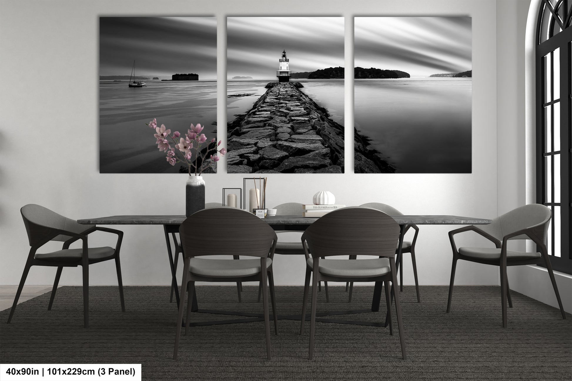 a black and white photo of a table and chairs