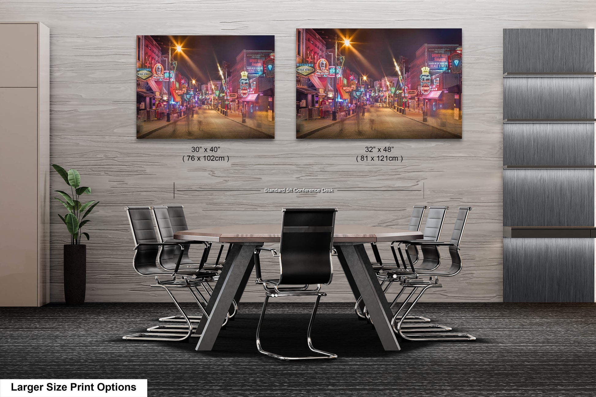 a room with a table and chairs and two pictures on the wall