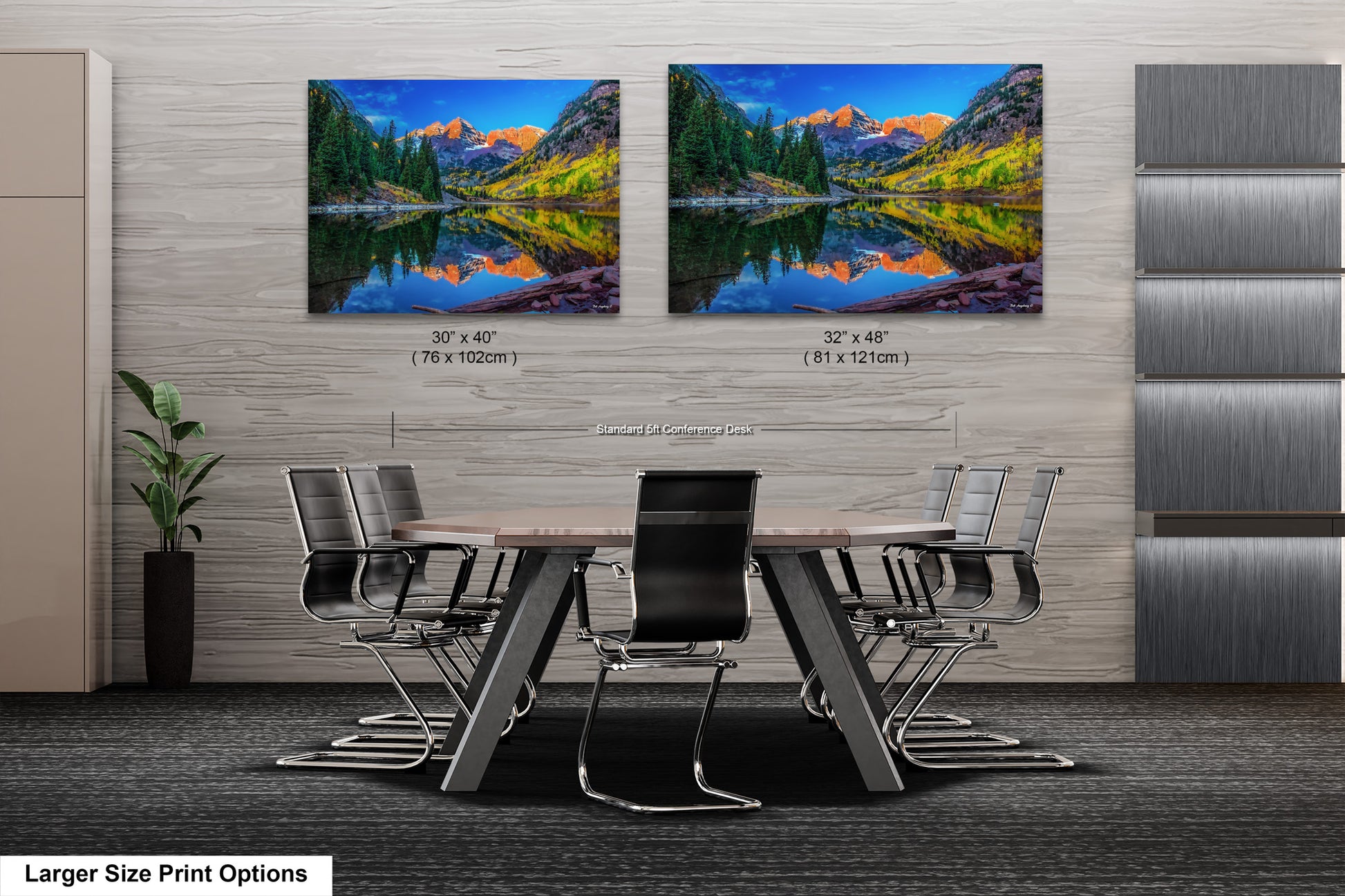 a dining room table with chairs and a painting on the wall