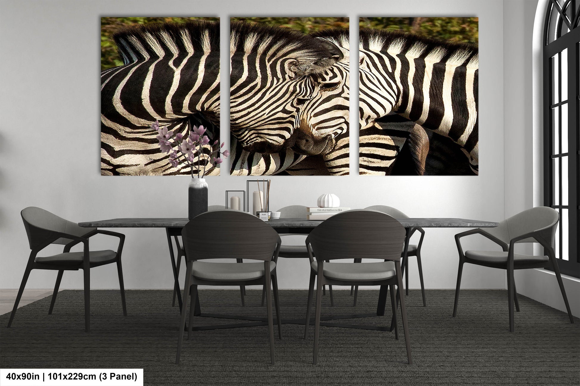 a couple of zebra standing next to each other