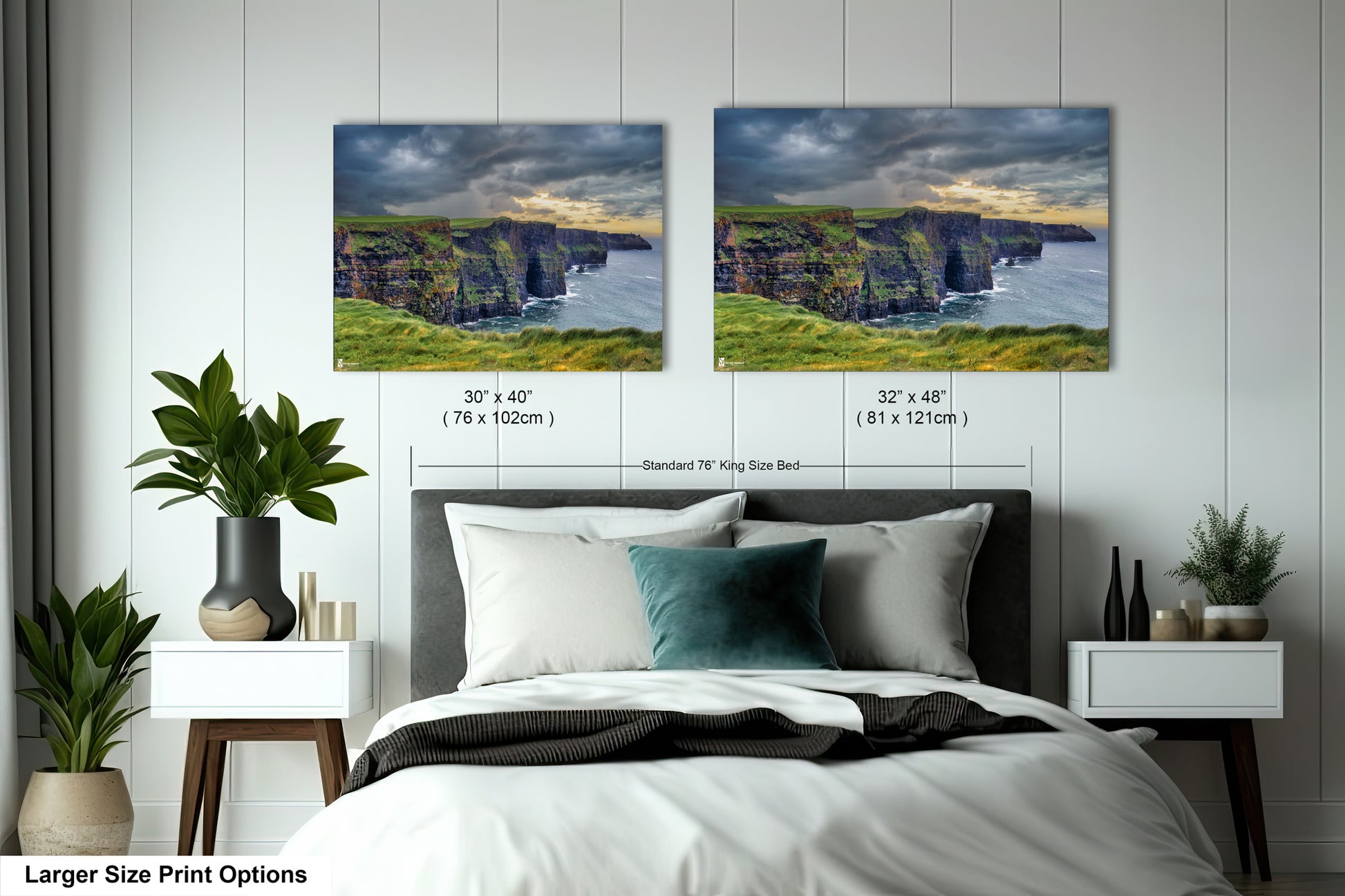 a bedroom with a large bed and two pictures on the wall