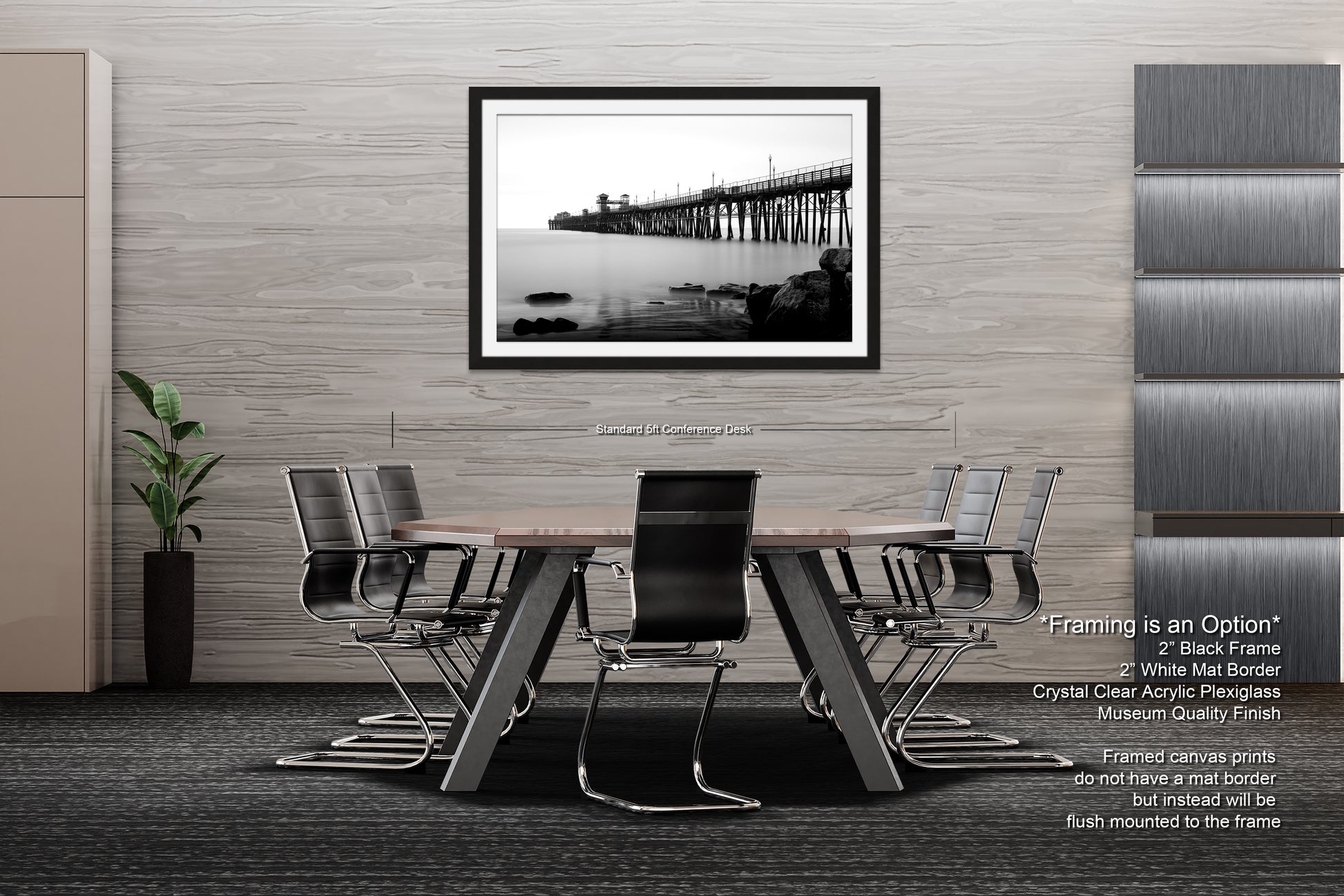 a black and white photo of a table and chairs
