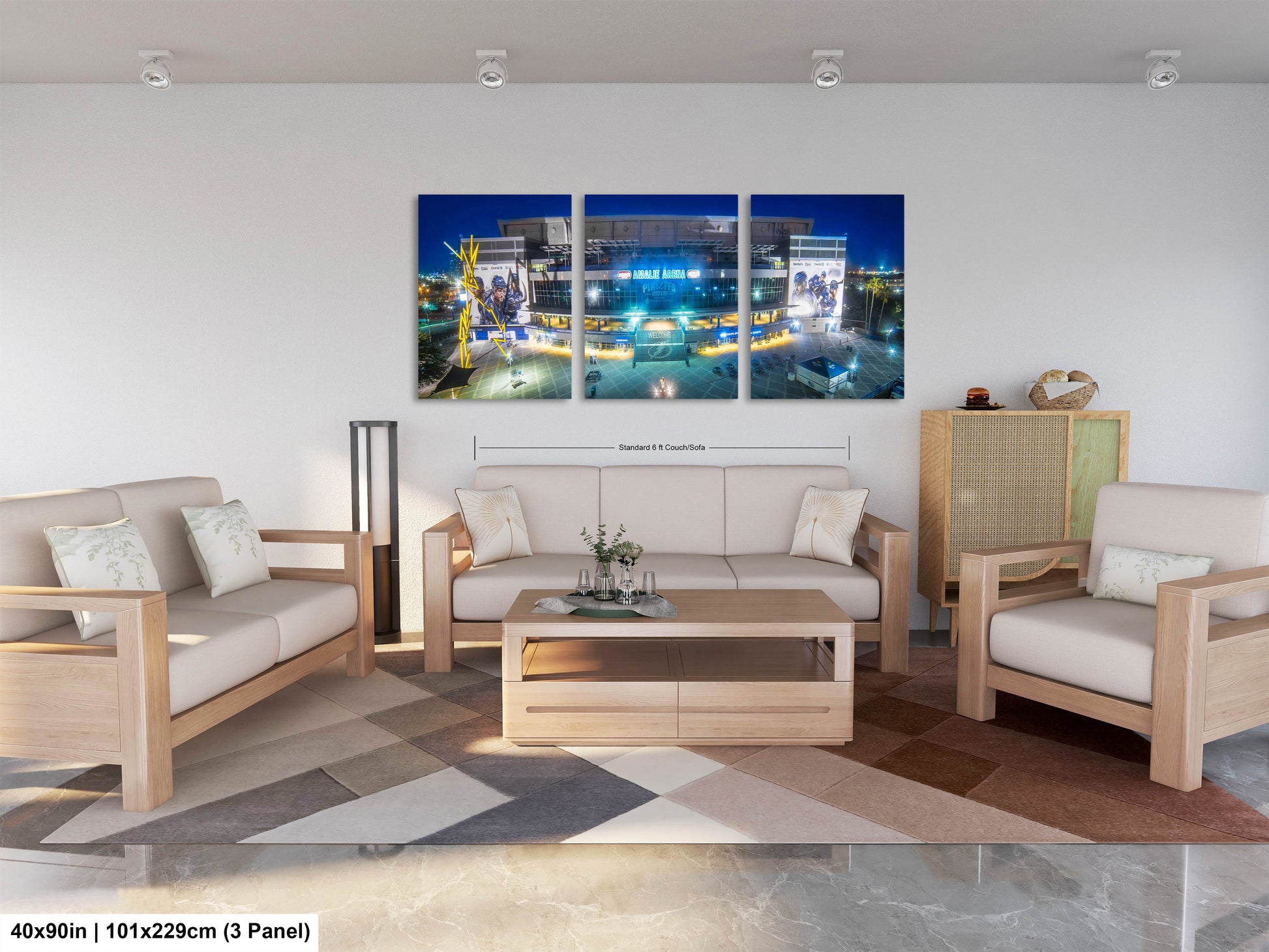 a living room filled with furniture and a painting on the wall