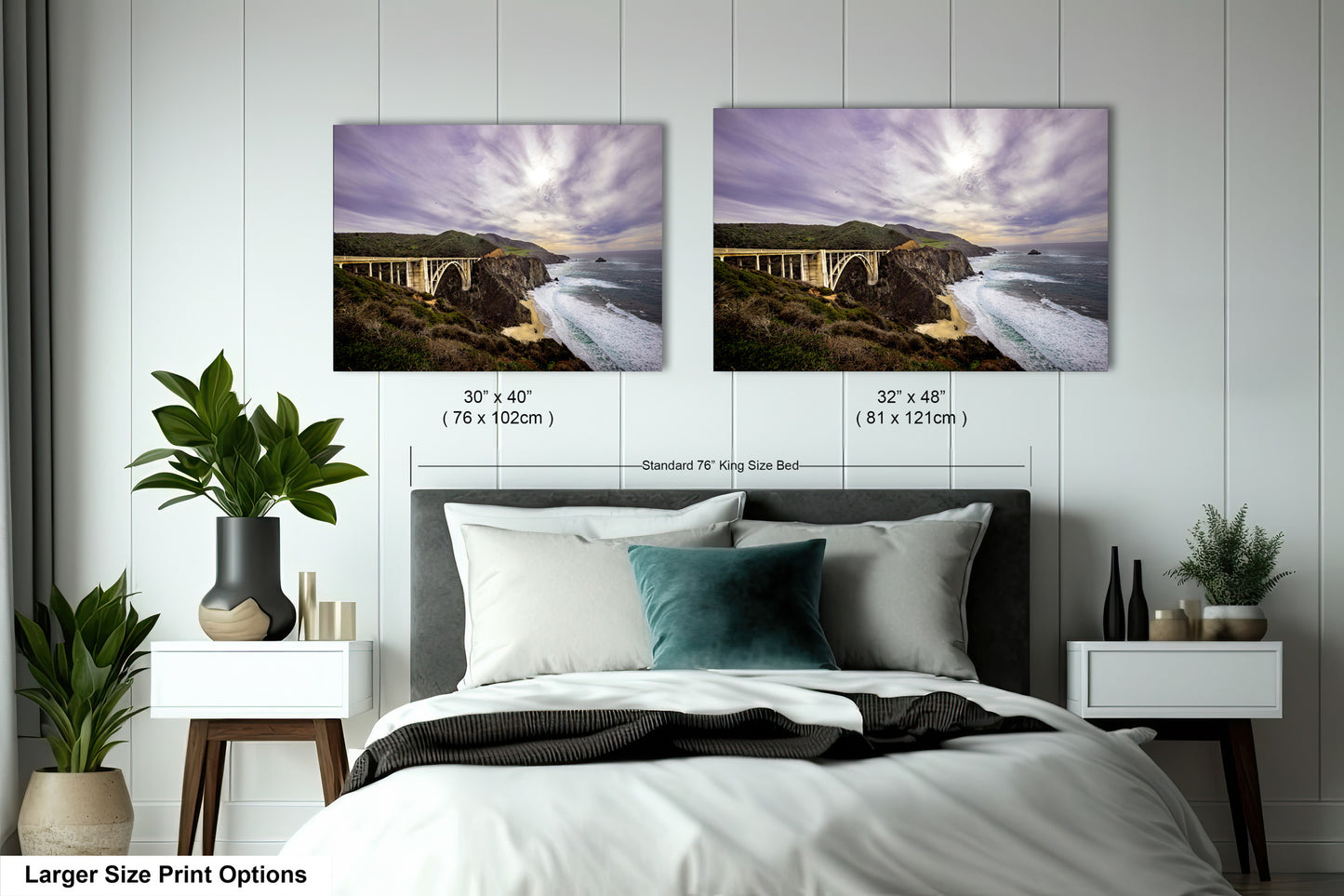 a bedroom with a bed and two pictures on the wall