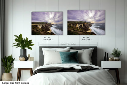 a bedroom with a bed and two pictures on the wall