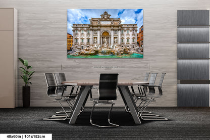 a room with a table and chairs and a painting on the wall