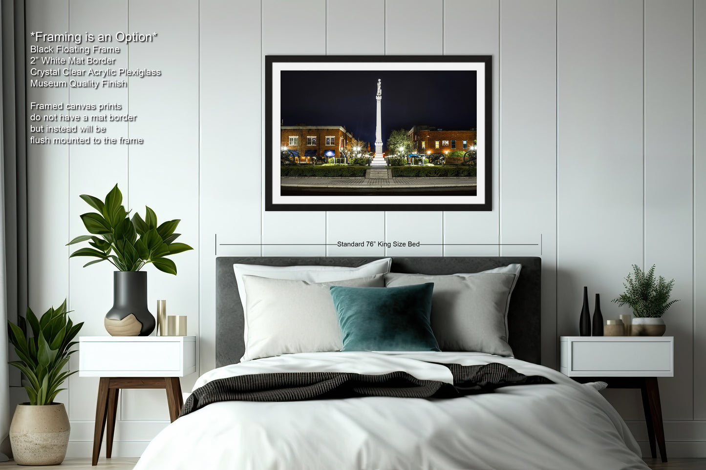 a bedroom with a bed and a night view of a city