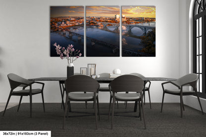 a dining room with a table and four chairs
