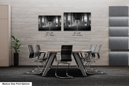 a dining room table with chairs next to a wall