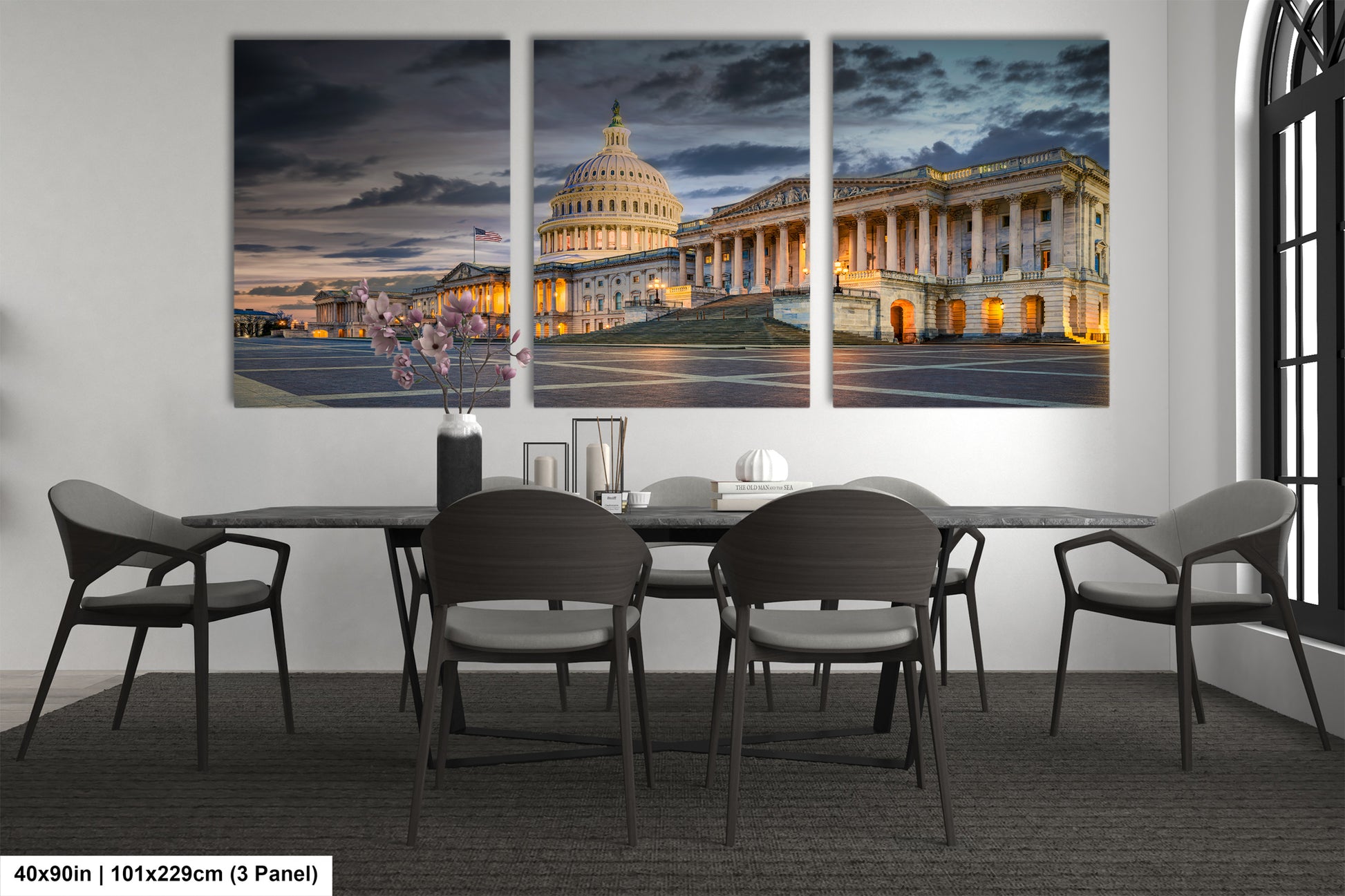 a dining room table with chairs and a picture of the united states capitol building