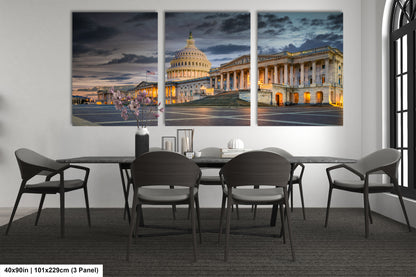 a dining room table with chairs and a picture of the united states capitol building