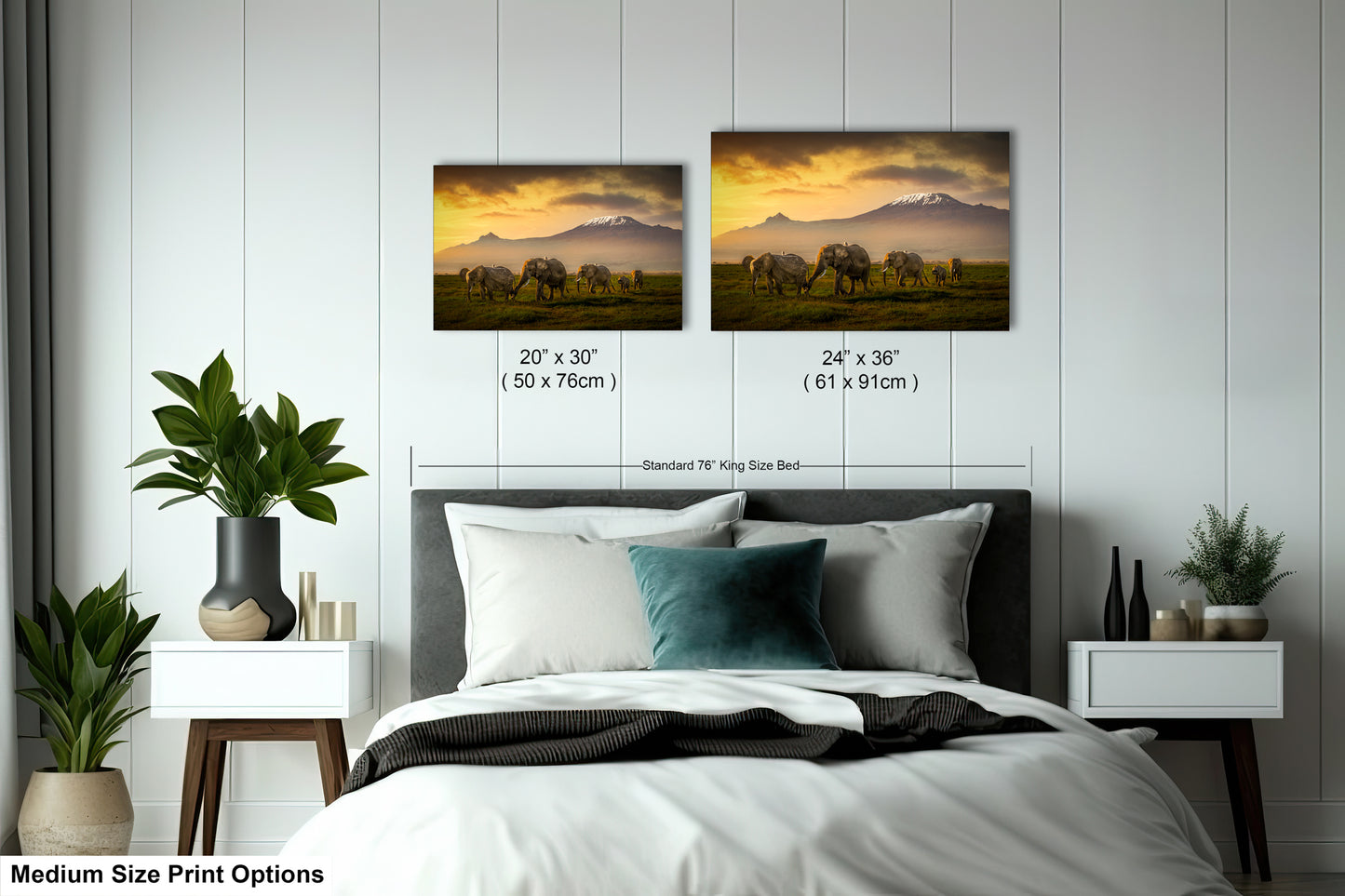 a bedroom with a bed and two pictures on the wall