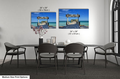 a dining room with a table and chairs