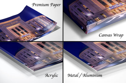 The image is a collage of four different views of a building at night, with the first three images showing the building from different angles and the fourth image showing the building from a different perspective.