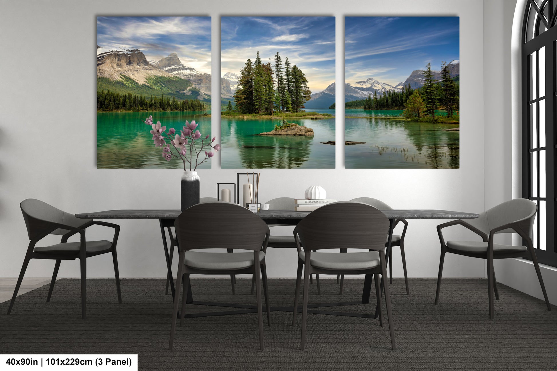 a dining room with a table and four chairs