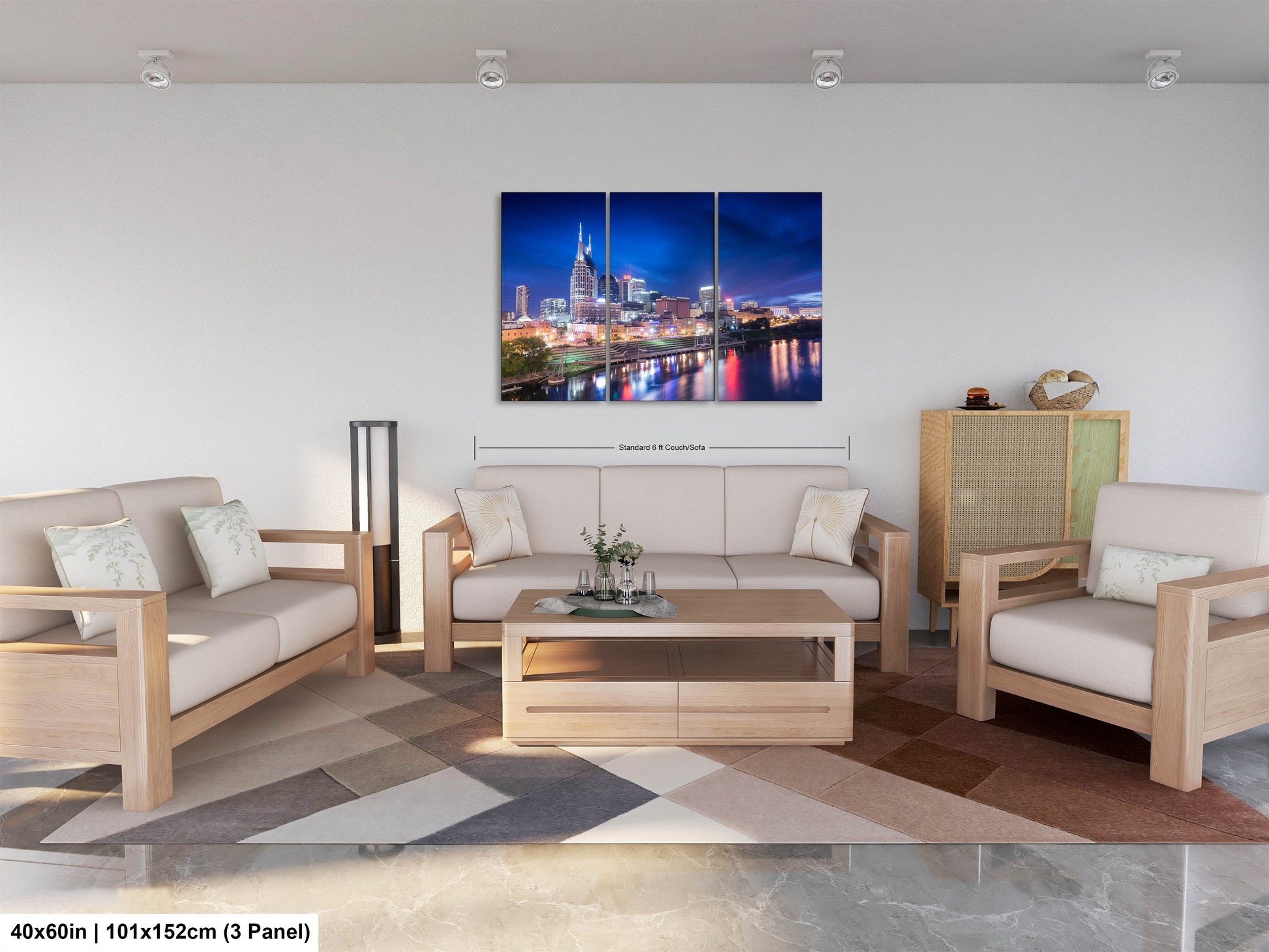 a living room filled with furniture and a painting on the wall