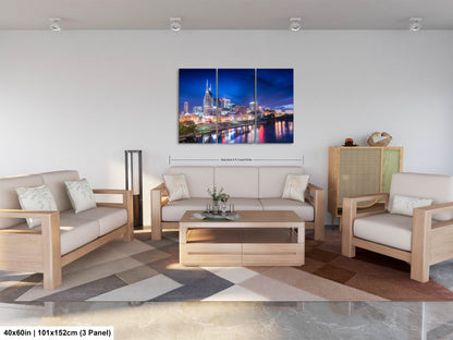a living room filled with furniture and a painting on the wall