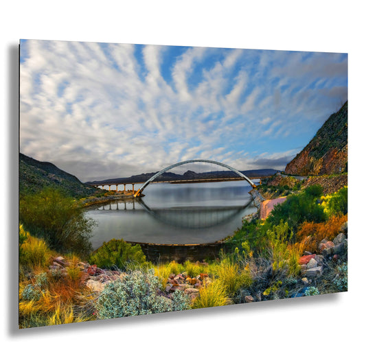 a painting of a bridge over a body of water