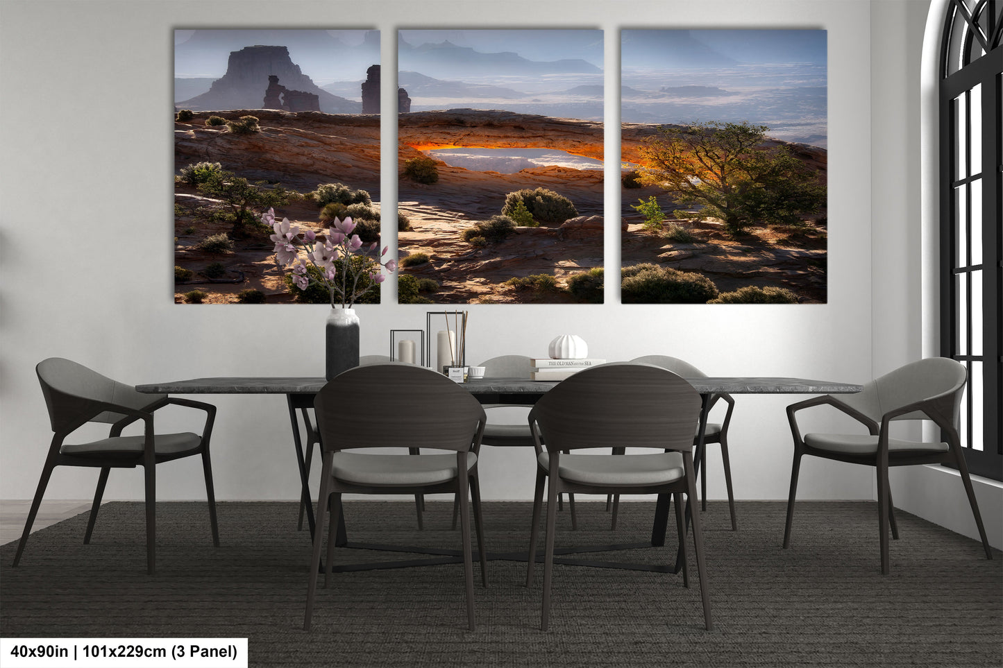 a dining room with a table and four chairs