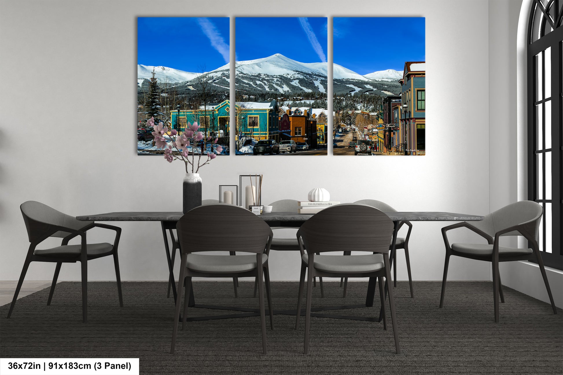 a dining room with a table and chairs