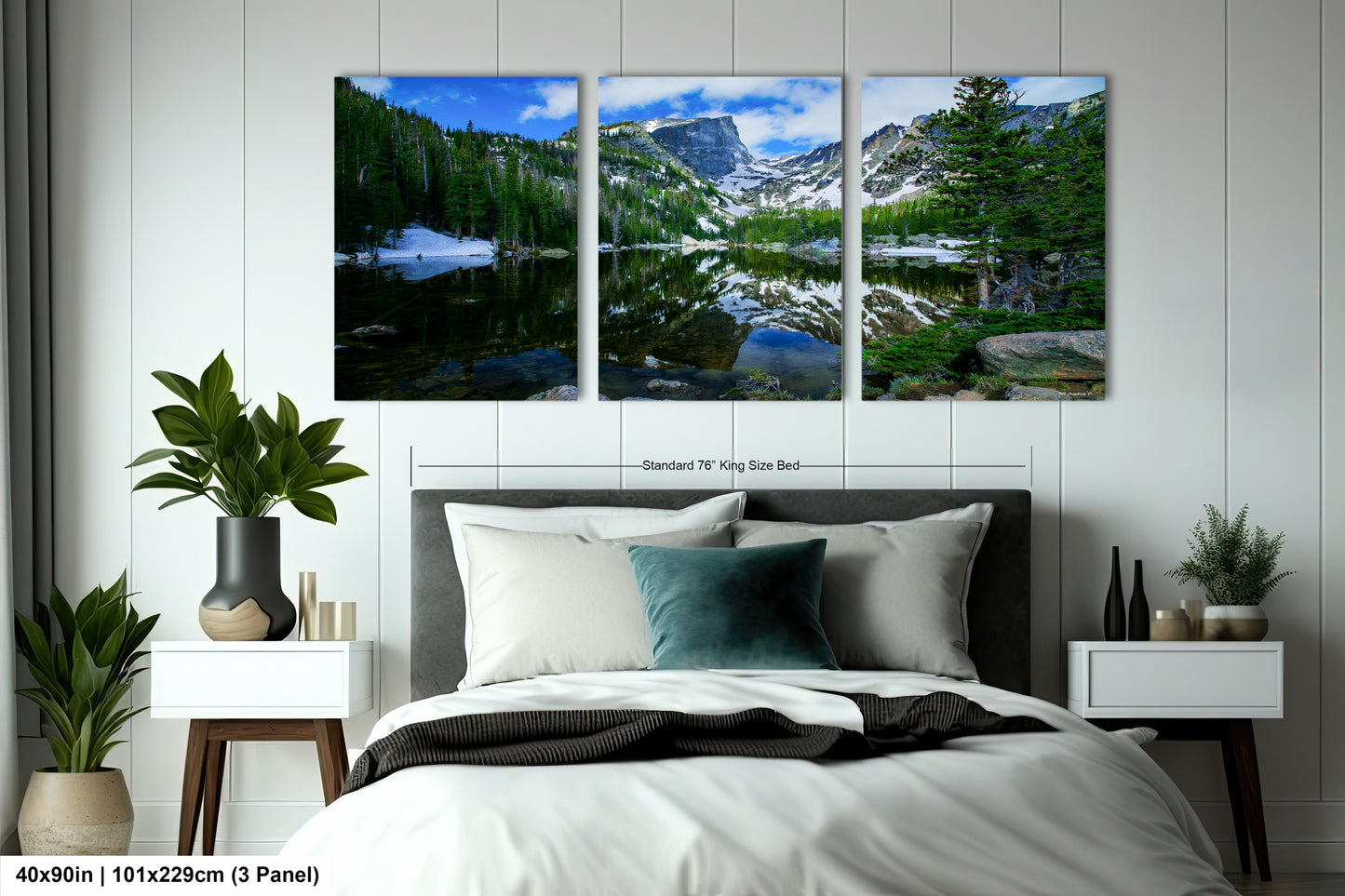 a bedroom scene with a bed and two paintings on the wall
