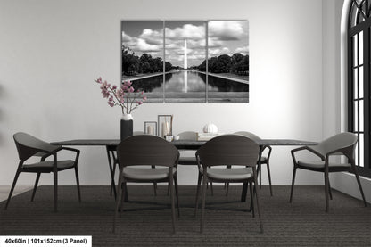 a black and white photo of a dining room table