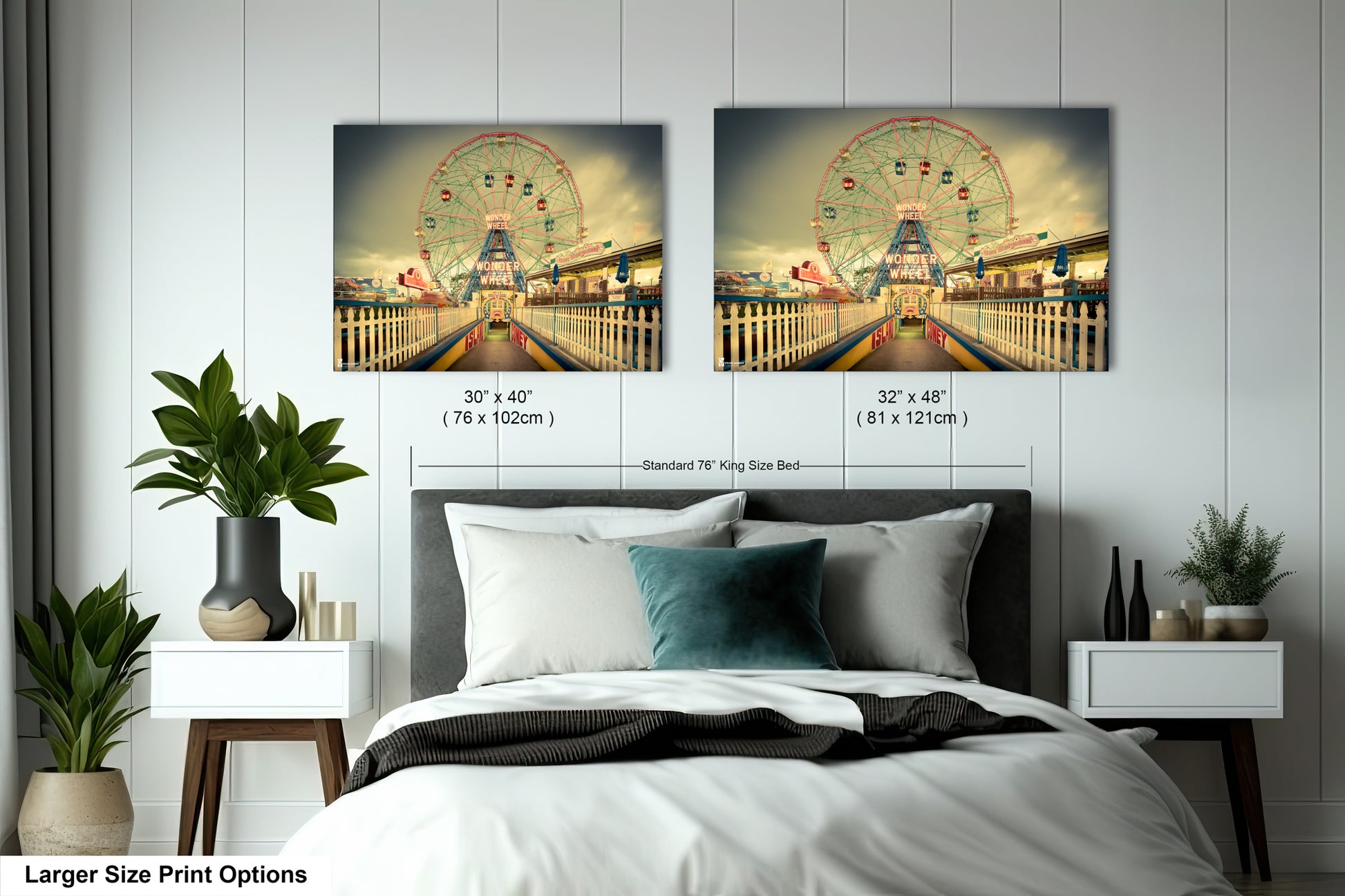 a bedroom with a large bed and two pictures on the wall