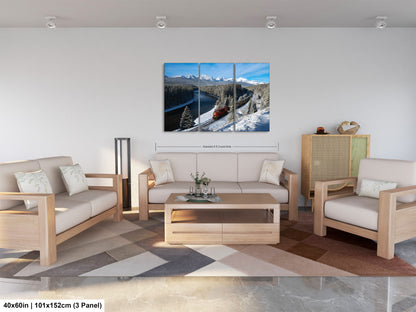 The image is a modern living room with a large, colorful painting of a mountain landscape hanging on the wall. The room is furnished with a sofa, two chairs, and a coffee table. The painting is framed in a 3x3 panel, and the dimensions are provided as 40 inches by 101.5 centimeters.