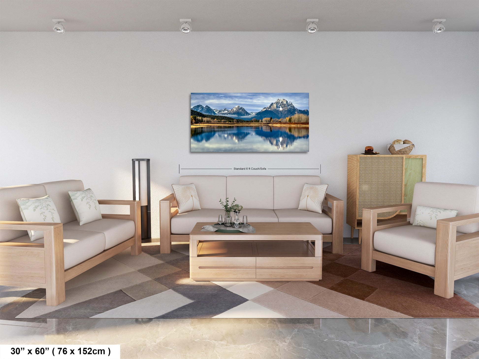 a modern living room with a large landscape painting hanging on the wall. The painting features a serene mountain lake surrounded by trees and mountains, creating a peaceful and natural atmosphere. The room is furnished with a sofa, two chairs, and a coffee table, providing a comfortable and inviting space for relaxation and socializing.