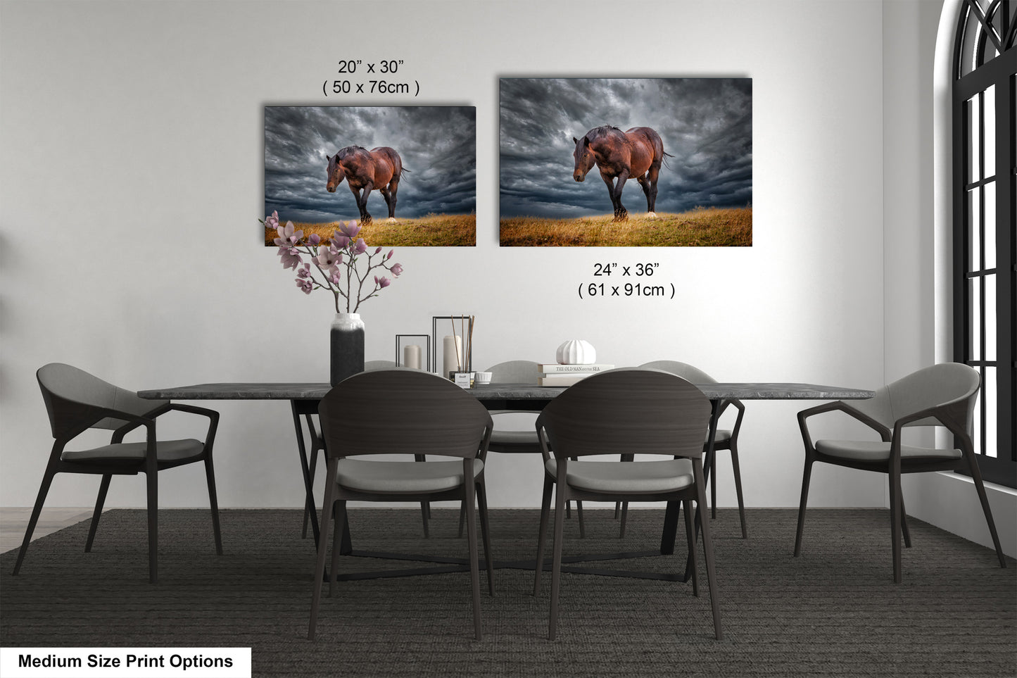 a dining room table with four chairs and a picture of a horse on the wall