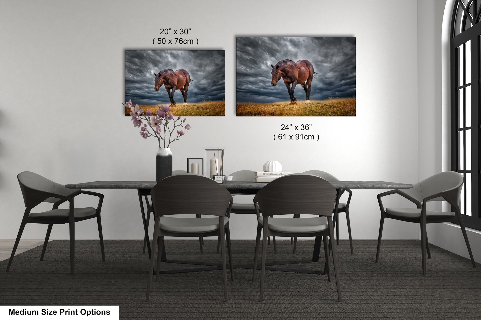 a dining room table with four chairs and a picture of a horse on the wall
