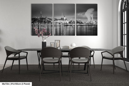 a black and white photo of a dining room table