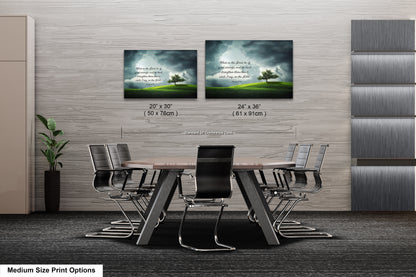 a dining room table with chairs and two pictures on the wall