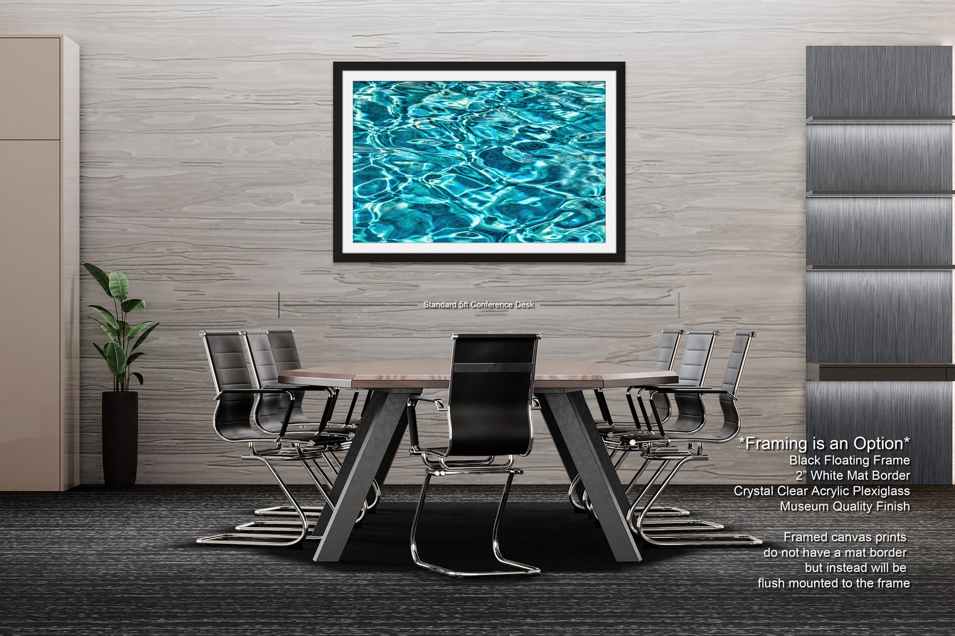 a modern office space with a large framed artwork of a blue water surface hanging on the wall above a wooden table surrounded by black chairs.