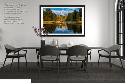 a picture of a dining room with a table and chairs