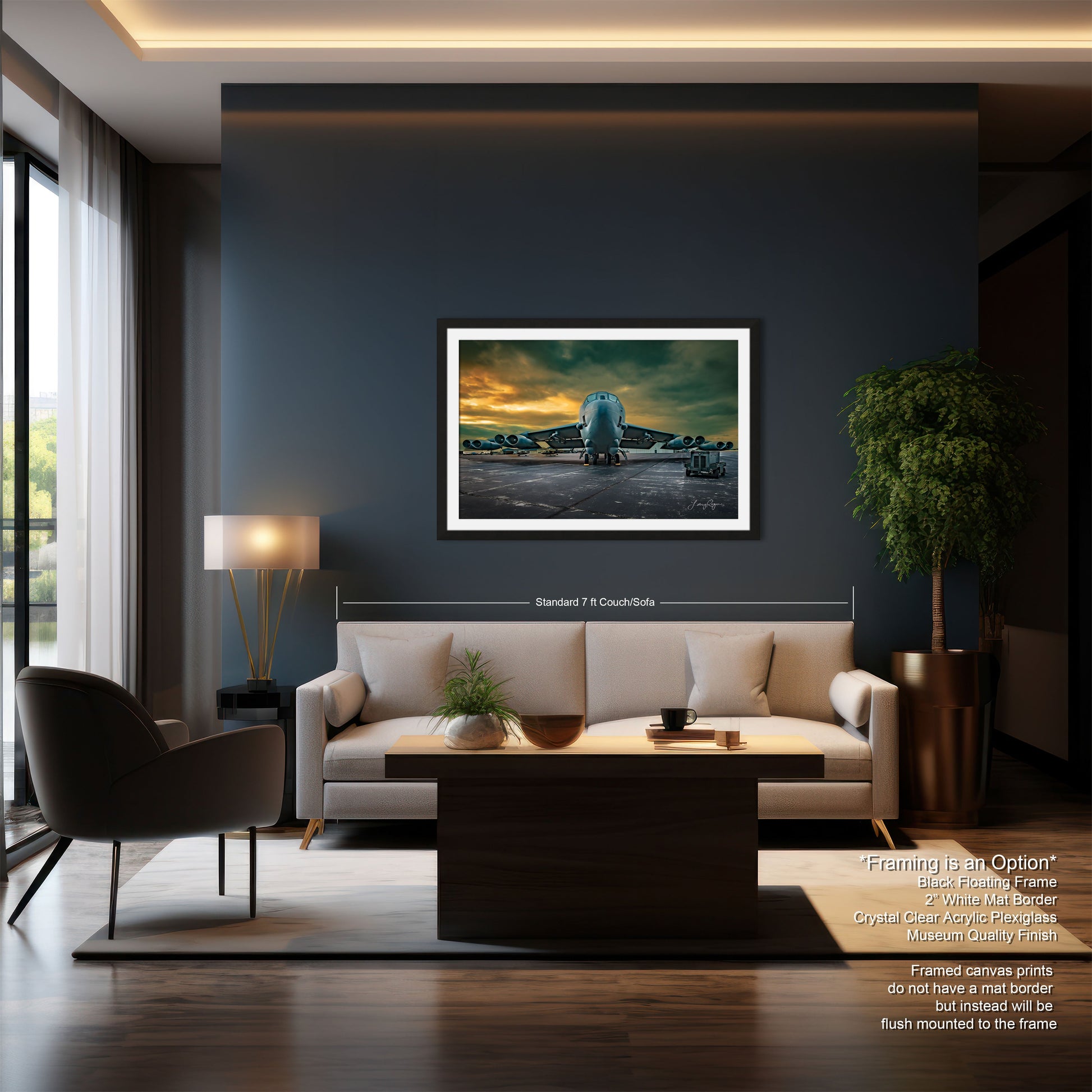 a living room with a couch a chair and a painting