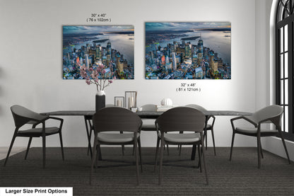 a dining room table with chairs and a painting on the wall