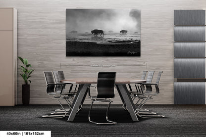 a black and white photo of a table and chairs