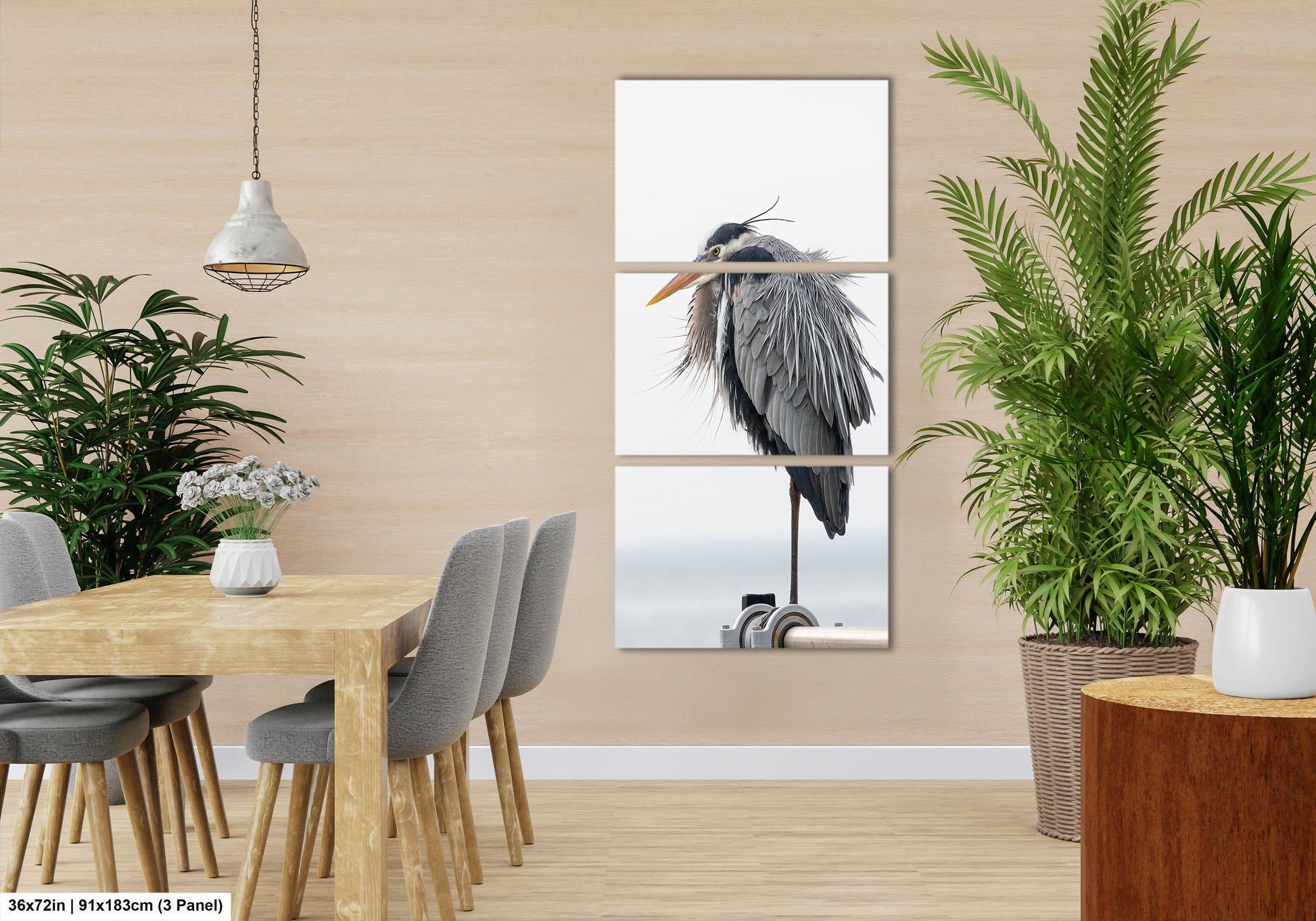 a room with a table and chairs and a bird hanging on the wall