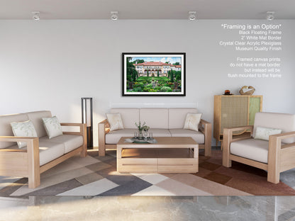 a living room filled with furniture and a painting on the wall