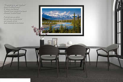 a dining room with a table and chairs